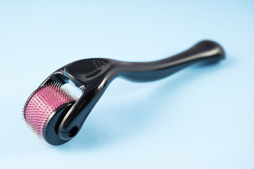 Obraz premium Derma roller for medical micro needling therapy. Tool also known as: Derma roller, mesoroller, meso-roller, mesopen.