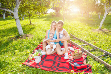 Happy family enjoying a picnic outdoors