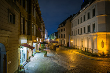 Fototapeta na wymiar Old city street by night