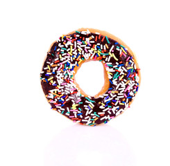 Sprinkle donut toppings on white background