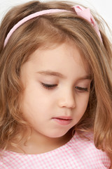 Adorable little child girl face closeup portrait