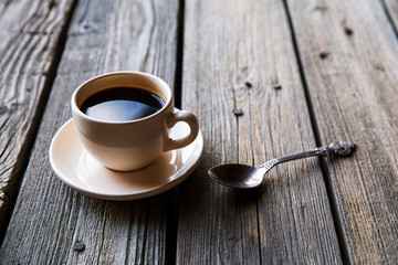 Coffee cup on wooden table background,Top view