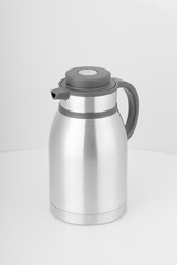 Thermo or  flask from stainless stee on background