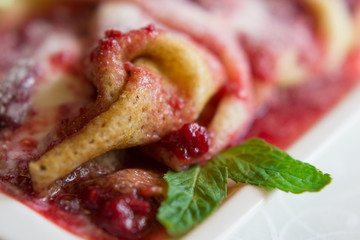 Pancakes with mascarpone and berry sauce