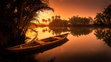 Beautiful Sunset at the riverside of Hoi An, Vietnam - obrazy, fototapety, plakaty