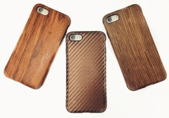 Three wooden iphone cases - 125480962