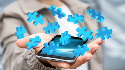 Businessman holding flying puzzle pieces ‘3D rendering’