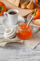 Delicious peach and orange jam on a breakfast table.