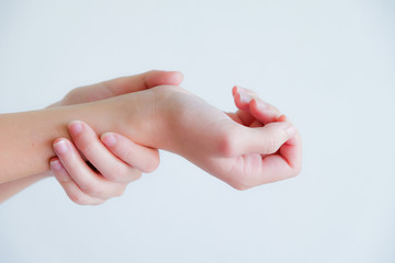 soft focus on hand of woman feel pain that are sign of Rheumatoi