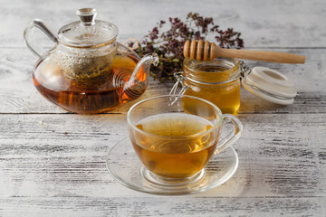 warm honey tea with herbs. Healthcare concept
