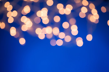 Lights: Defocused Christmas Lights Against Blue Colored Backgrou