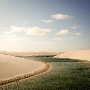 Sand dunes and freshwater lagoons found in the Lençóis Maranhenses National Park. Maranhão, Brazil.