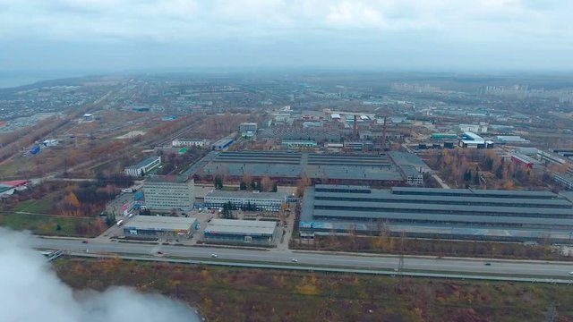 Aerial view of a large industrial complex, huge warehouse. 4K.