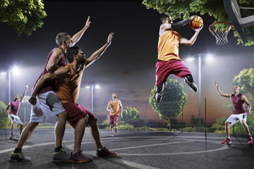 Basketball players in action on court
