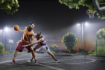 Basketball players in action on court