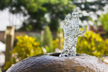 Water fountain splash in hand shape