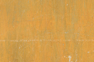 Wall fragment with scratches and cracks