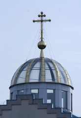 Fototapeta na wymiar Orthodox cross on top of the dome