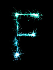 Sparkler firework light alphabet F (Capital Letters) at night