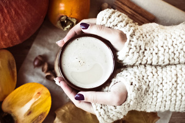 Spicy pumpkin latte on a wooden table