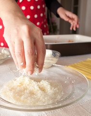 Preparation of homemade lasagna.