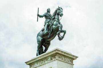 Fototapeta na wymiar Madrid Plaza de Oriente, Felipe IV monument. Madrid, Spain.