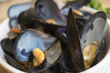 mussels soup with tomatoes and parsley