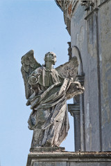 one of the statue of the saint on the facade of the Catholic Church of Exaltation of the Holy Joseph, 18th century in Ukraine