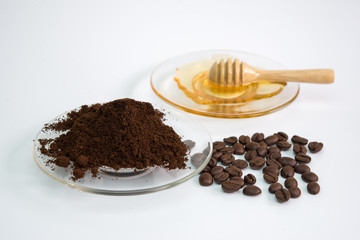coffee scrub  and honey on white background