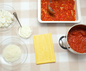 Preparation of homemade lasagna.