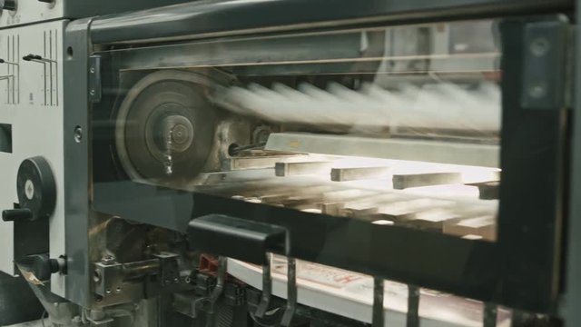 Professional printing machine in action, polygraph industry