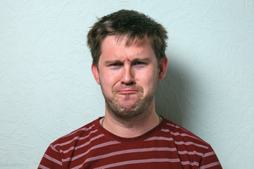 Obraz premium Close up of a funny young man. The collage of young man with different emotion. emotional card. 