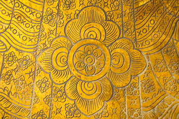 Fototapeta na wymiar Golden Thai Traditional Art Flower (Lai Thai) Handmade