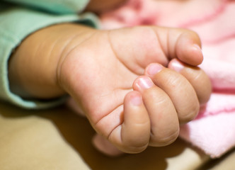 Infant Child Hand Clenched Fist