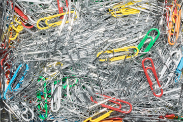 colorful background texture of a pile of paper clips