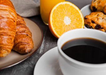 Healthy breakfast with coffee juice fruits pastry