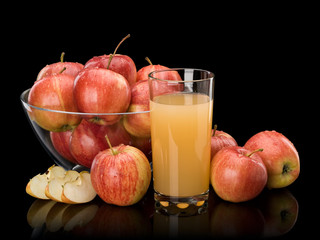 Ripe apples and juice with pulp