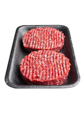 Tray with raw beed burgers isolated