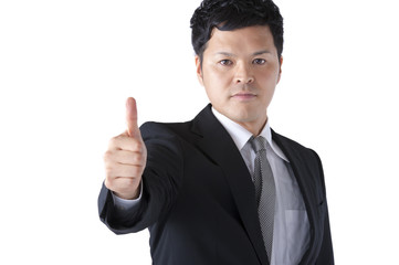 親指を立てたスーツ姿の男性