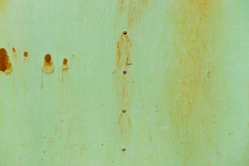 Old green metal plate