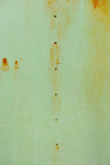 Old green metal plate