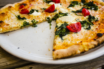 Delicious traditional Italian pizza tricolor. 