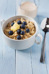 Oat porridge with berries and butter
