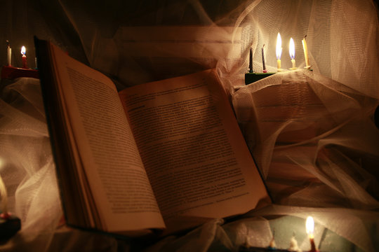 Book and candle light