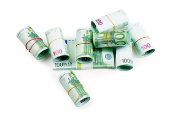 Euro banknotes in stacks and rolls isolate