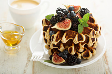 Fluffy breakfast waffles with fresh fruits