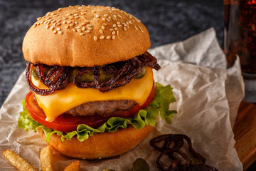 Burger, hamburger with french fries and fresh vegetables.