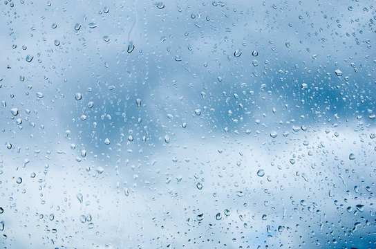 Raindrops on glass closeup