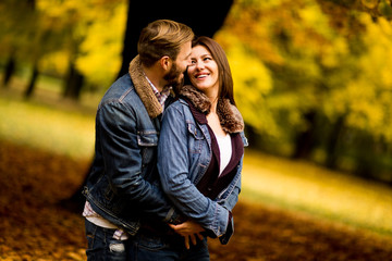 Loving couple in autumn park