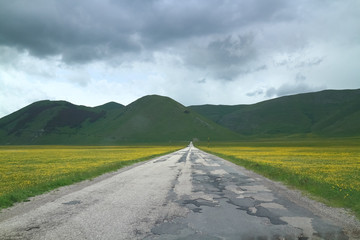 Castelluccio and the valley (Norcia region, Italy) as seen before the devastating earthquake of October 2016. Now the town of Castelluccio is almost completely destroyed.